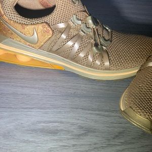 Nike women Shox metallic gold sneakers